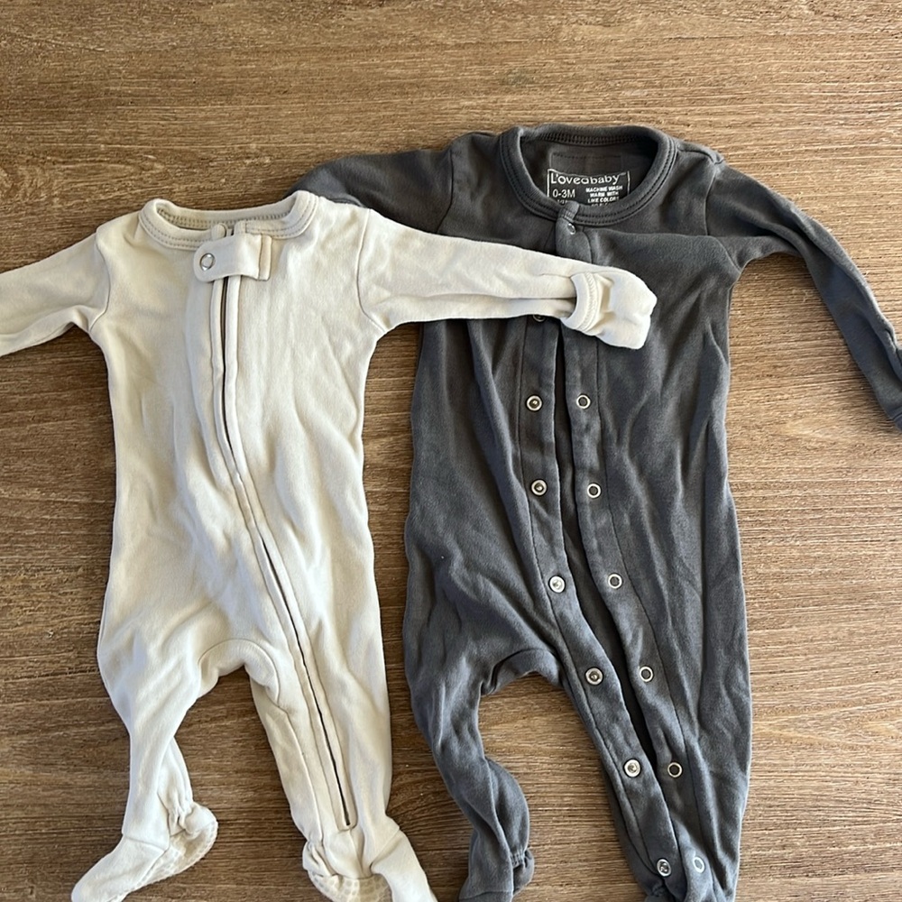 Loved Baby footies - one is size preemie/ NB and other is size 0-3 months